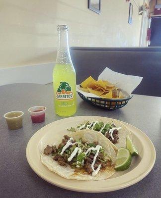 carne asada street tacos, chips & salsa, and Jarritos