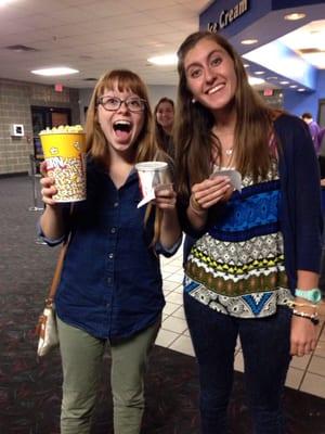 Happy popcorn and $5 movie day.