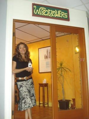 Christina Herrera, owner, in front of her salon.