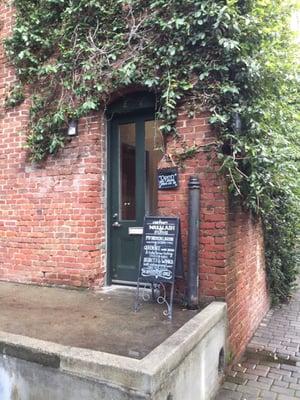 Tucked behind Tomatinas Restaurant