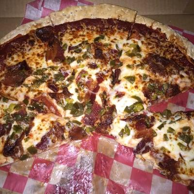 Pizza was tasty.  $12.50 for a 16" large and $1.50 per topping. Cheese included.