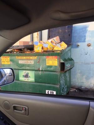 Cans of tomato salsa behind ritas wholesale.