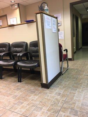 Not very welcoming. Receptionist is behind the wall.