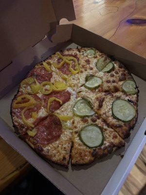 Newwww pizza and new menu by JMac! Half pickle and half banana pep + pepperoni