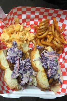 Pulled pork sliders on a Hawaiian bread bun with a side of crispy curly fries and Mac n Cheese