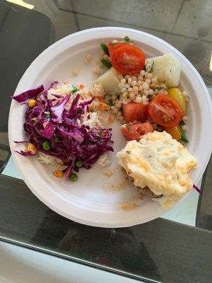 Poke salmon (under the rice), cous cous???, mashed potatoes and meatballs that taste like cat food. What kind of confusion cuisine is this?