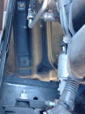 Just a part of the car left dangling after an oil change