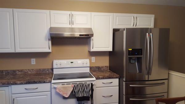 Installation of a new range hood where there never was one.