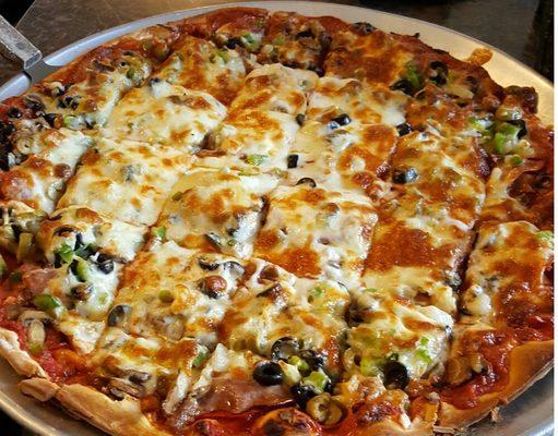 Homemade dough, homemade Sauce, fresh ingredients & shredded blends of cheese right from the block!