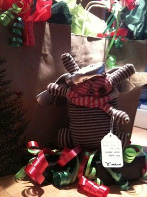 The sockmonster isn't telling what is in the bags, even if she is naughty.