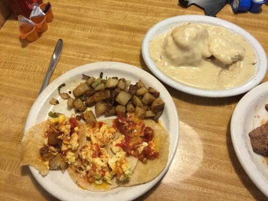 Guevos rancheros w/ biscuit and gravy breakfast