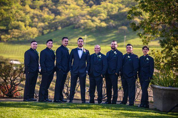 Groomens decked out in black on black.