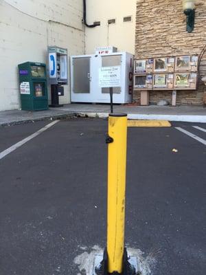 The "friendly" storefront. No parking until 6PM everyday- reserved for owner. Busy, I guess people like the attitude.