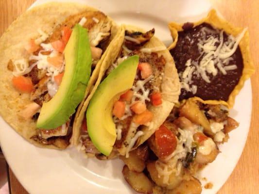 At last! Tex-Mex that we love! Fish tacos special order- mushrooms, onions and homage corn tortillas.