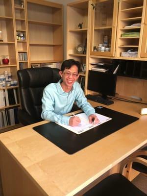Dr. Wong at his office.