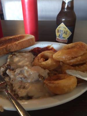 Hand breaded Chicken Fried Steak with house made onion rings! Yum!
