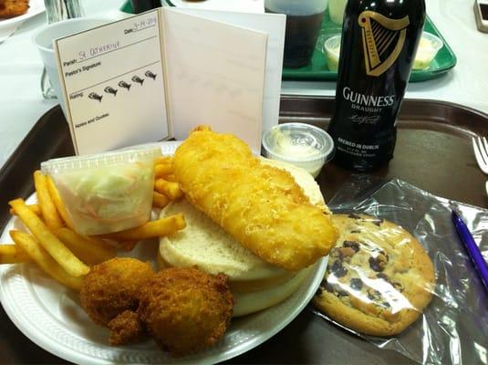 2014. $7 cod sandwich, fries, hush puppies, slaw and a cookie. Beer is by donation.