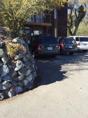 Parking closest to office door. He is skittle hard to find the first visit but worth it.