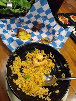 Giant bowl of rice they call loaded jambalaya. No meat at all and some burned hush puppies. Don't eat here get your beer or liquor and go.