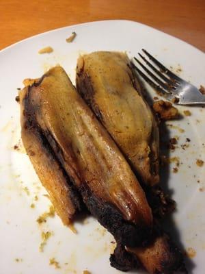 Great tamales! Pork with smokey red sauce (also chicken with green sauce made from tomatillos) in moist, creamy masa.