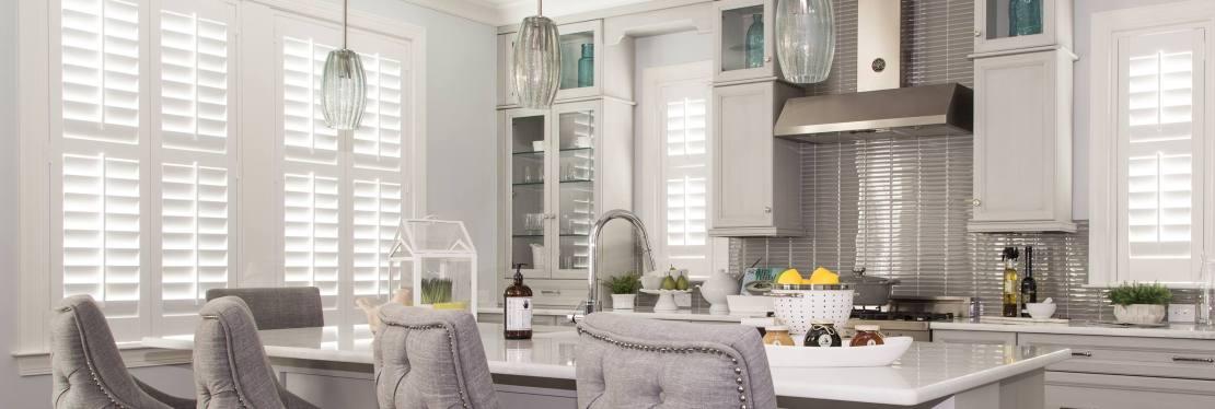 Sunburst Shutters & Window Fashions